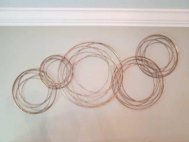 Gold Tone Interlaced Concentric Circle Metal Wall Art: approx. 45"w x 18"h, Local Pickup Only