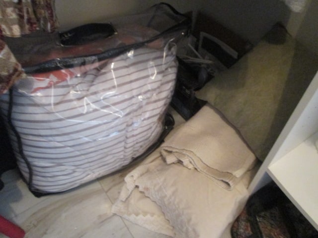 Contents of Walk-In Closet-Men's and Ladies Clothes, Wire Shoe Rack, Ladies Purses, - 13