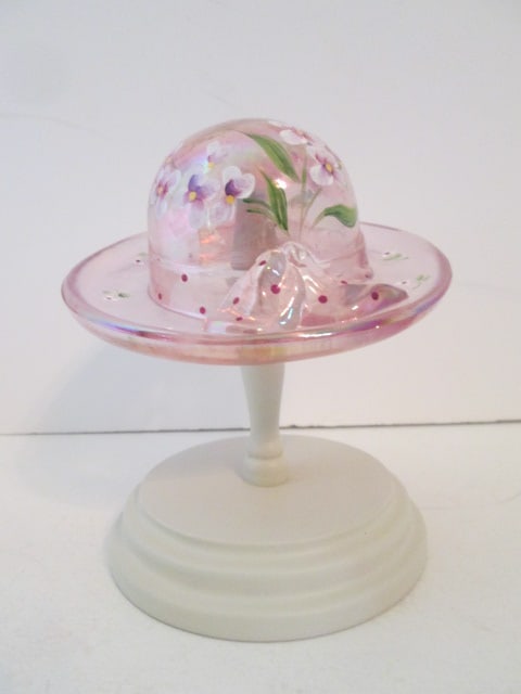 Fenton Signed Handpainted Pink Art Glass Bonnet with Wood Stand: hat 4 1/2"dia, on stand 5"h, signed by artist-see pictures for signature, has silver foil Fenton sticker and Fenton oval in relief