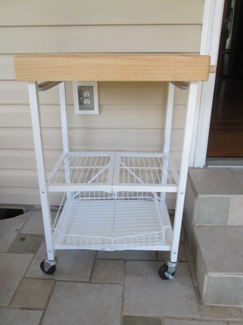 Folding Portable Butcher Block Island with Removable Folding Wire Tray: 25 1/2" x 20" x 36 1/2", has locking wheels, top has a few scuffs, Local Pickup Only