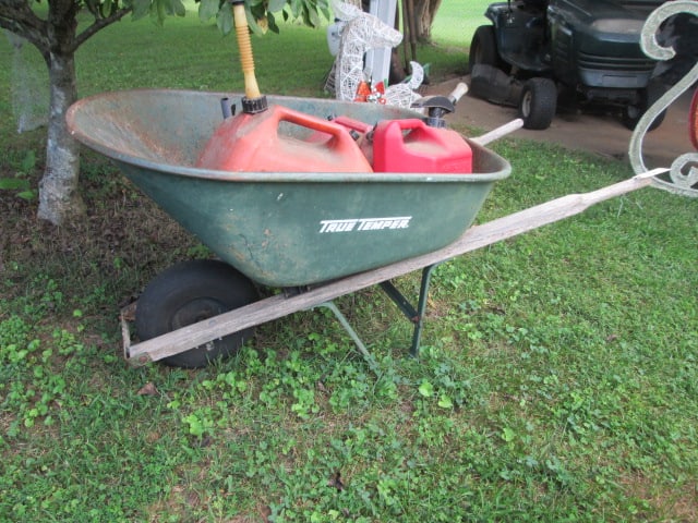 True Temper Metal Wheelbarrow with Wood Handles and Four Gasoline Jugs (1 of 6)