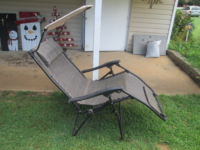 Anti-Gravity Lounge Chair with Sun Shade and Foot Rest: sun shade has a tear, Local Pickup Only