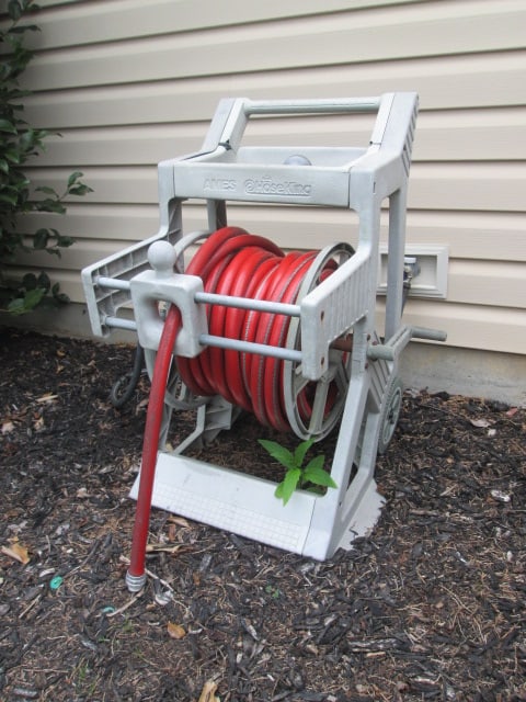 Ames Hose Reel with Heavy Duty Red Water Hose: reel has two small holes-see pictures and preview, Local Pickup Only