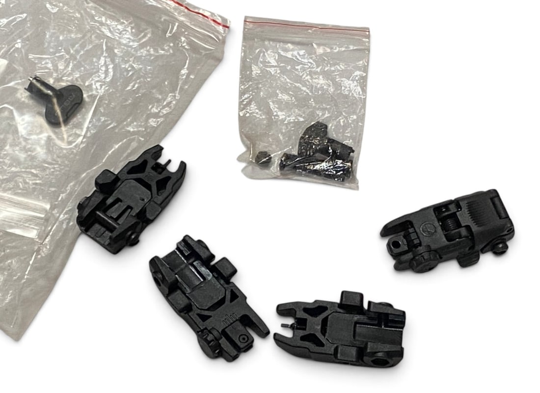 (2) Flip-Up Polymer Iron Sights: One Magpul MBUS and one off brand