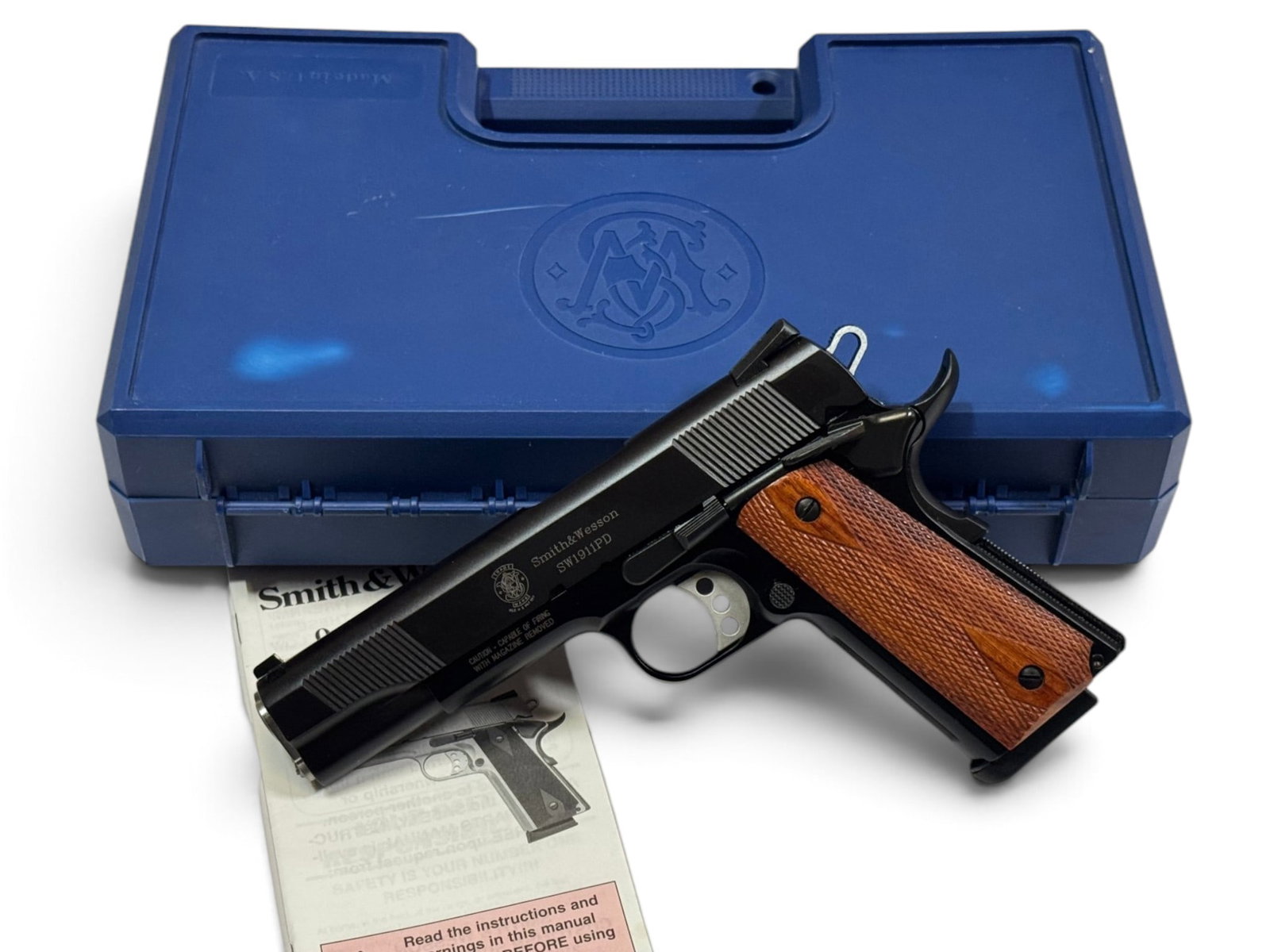 LNIB Smith & Wesson SW1911PD .45 ACP 5” Pistol in Original Box: S#: JRF1188 | Product No. 108286 | 5” Barrel | Comes in factory hard case with matching label, manual, paperwork, lock, factory test shell and (1) 7-Round Magazine |||| CONDITION: Excellent,