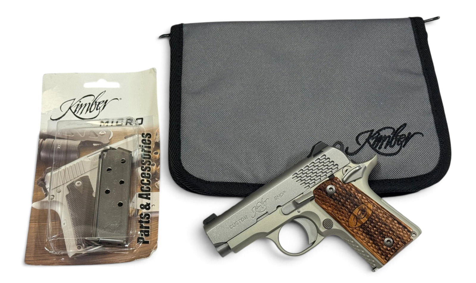 Excellent Kimber MICRO RAPTOR .380 ACP Semi-Automatic Pistol w/ Soft Case & 2 Mags: S#: P0011146 | 2.75” Barrel | Raptor-series compact .380 ACP pistol featuring distinctive scale-pattern slide serrations and matching textured grip treatment | Comes with Factory Soft Case and