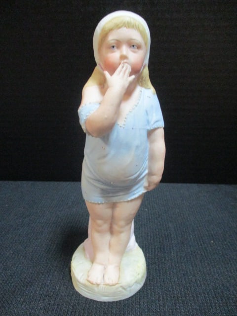 Bisque Porcelain 'Piano Baby' Figurine: 7 1/2"