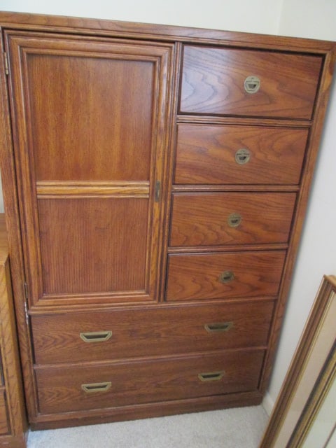 Bassett Oak Armoire: 38" x 18" x 57 1/4", upper section has four drawers and door with two adjustable shelves, lower section has two long drawers, Local Pickup Only