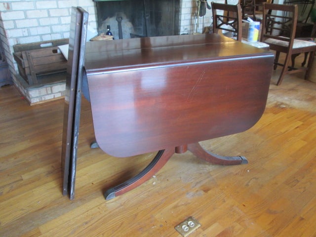 Vintage White Furniture Co. Mahogany Drop Leaf Table with Brass Cap Splay Feet: Includes Two 12"w Leaves, 24 3/4"(drop sides down)56 1/2"(sides up) x 38" x 29", veneer chip and some scuffs, Local Pickup Only