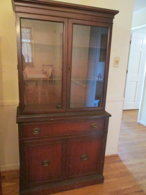 Vintage Mahogany 1 Piece China Hutch with Drawer: 35" x 16 3/4" x 69", base has dovetail drawer over door storage with shelf, upper china hutch has glass doors with two wood plate groove shelves, some scratches and nicks, Local Pickup Only