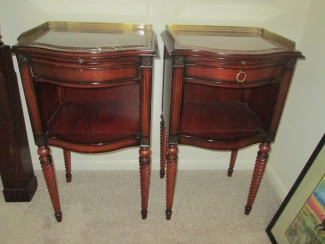 Pair of The Bombay Co. Mahogany Marble Top Tables with Galley Rail: Bowfront Single Drawer Cabinet with Open Shelf, Pullout Shelf and Barley Twist Legs, 19" x 16 1/2" x 33 1/2"(top of rail), One missing drawer pull, some scuffs and small chips, Local Pickup Only