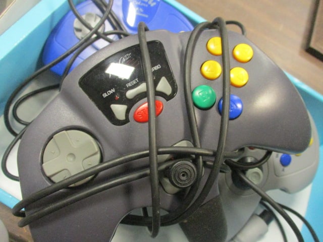 Three Controllers for Nintendo 64 Game Console-(2)SuperPad 64, (1)Mad Catz - 4