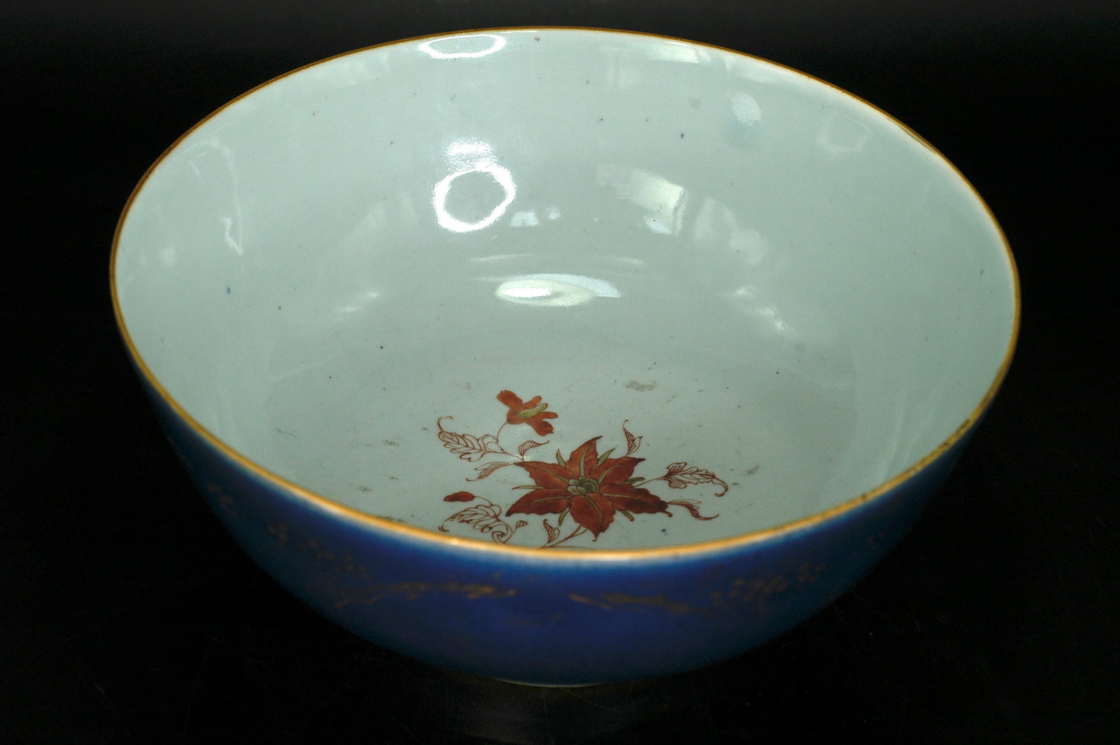 Qing Dynasty Mid-to-Late Period (Qianlong to Daoguang) Powder-Blue Gilded Medallion Floral Bowl: H11cm x W27cm. Powder Blue Glazed Gilt-decorated Reserve Floral Bowl (Export Porcelain). Core material: White porcelain body, powder blue glaze with gilt decoration and famille rose. Dating: Qing Kang