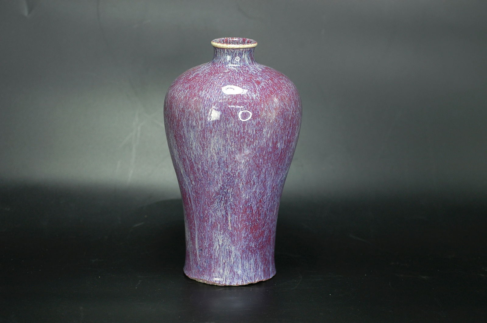 Qing Mid-Period (Qianlong-Jiaqing) Jingdezhen Flambe Glaze Flambé Red Meiping: H21cm W10.5cm. Mid-Qing Dynasty (Qianlong-Jiaqing) Jingdezhen kiln flambe glazed meiping with flame red patterns. Mid-Qing period folk kiln fine high-fired colored glaze display vessel, complete inher