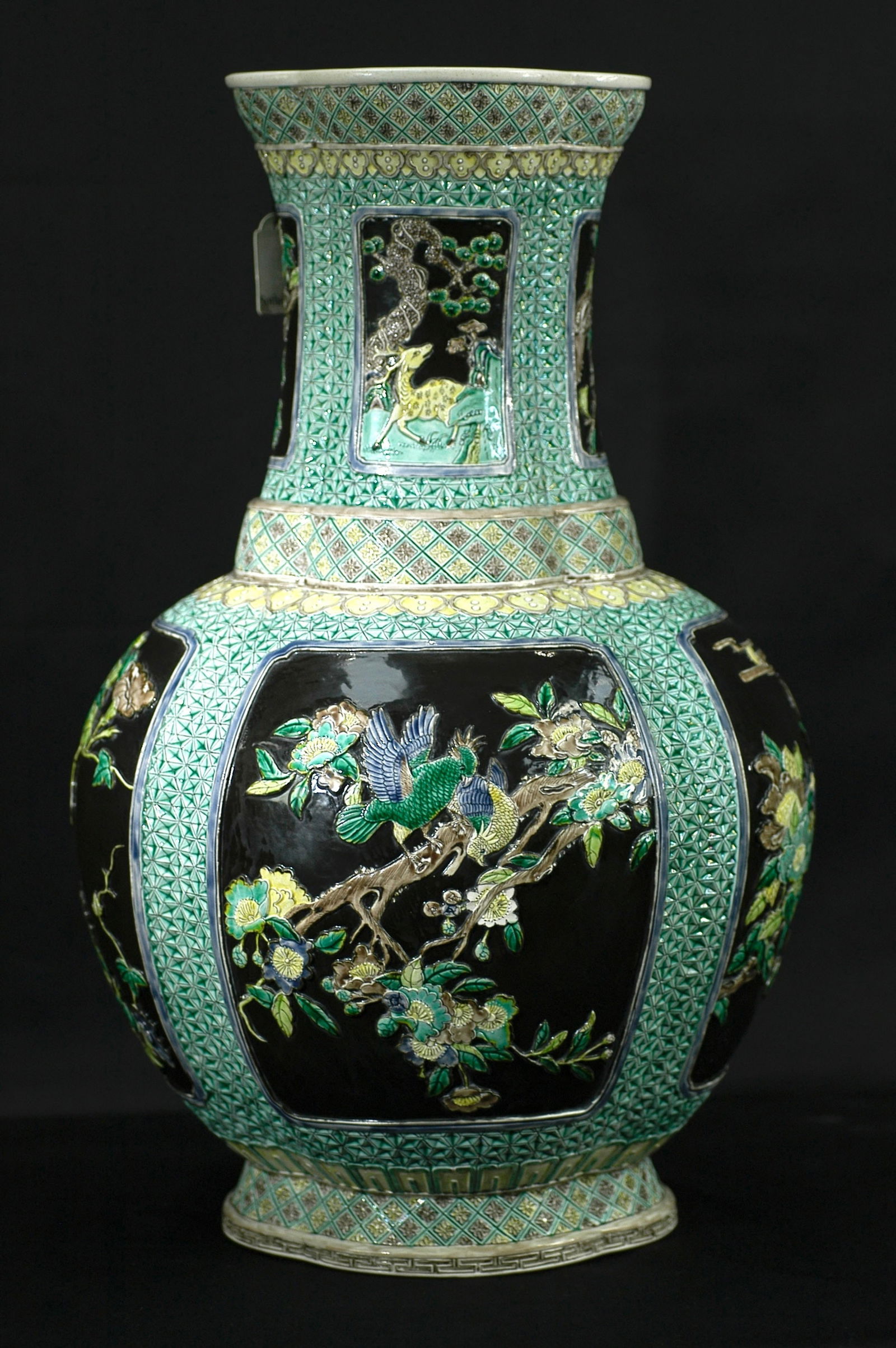 Republic Period Wucai Floral Mouth Vase with Qianlong Mark: H:47.5cm W:28cm Late Qing to Republican Period Imitation Qianlong Black Ground Green Glazed Cartouche Carved Porcelain Begonia-Form Vase with Floral and Bird Motifs. Core materials: Jingdezhen white p