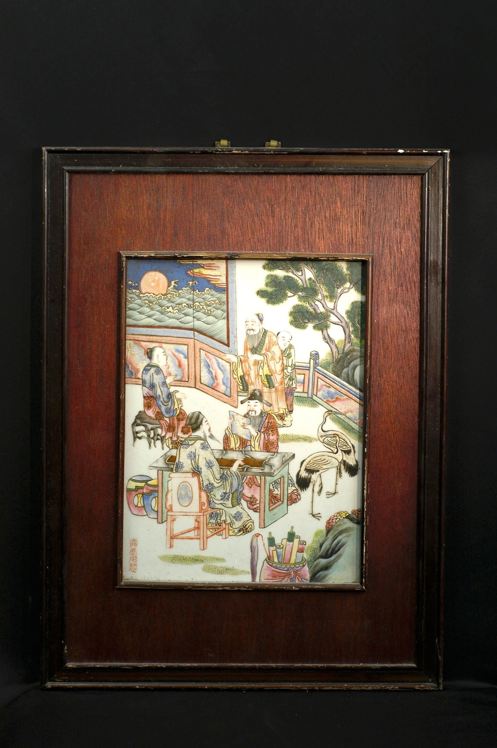 Qing Dynasty Jiaqing Imperial Mark Famille Rose Elegant Gathering Porcelain Plaque: H49.5 W36.8 (include wood frame) Period: Qing Jiaqing. Technique: Famille rose figure story porcelain plaque, rosewood frame. Mark: Jiaqing Imperial Made. Estimate: Jiaqing Imperial Made: $80,000-150,