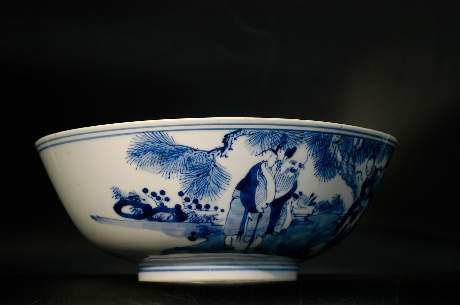 Qing Dynasty Blue and White Fulushou Figures Large Bowl with Kangxi Mark: H:9.4cm W:23cm Late Qing to Republic Period Blue-and-White Fu, Lu, Shou Three Star Deities Large Bowl. Civilian kiln with apocryphal mark (base inscribed 'Kangxi Nian Zhi,' not of the Kangxi period).