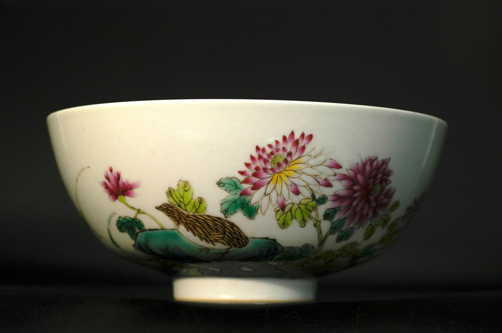 Republic Period Famille Rose Bird-and-Flower Twin-Fu Bowl with Qianlong Mark: H:6.5cm W:14cm Late Qing to Republic Period Imitation Qianlong Famille-Rose 'Peaceful Living and Prosperous Work' Bowl. Base inscribed with apocryphal mark 'Da Qing Qianlong Nian Zhi' (not of the peri