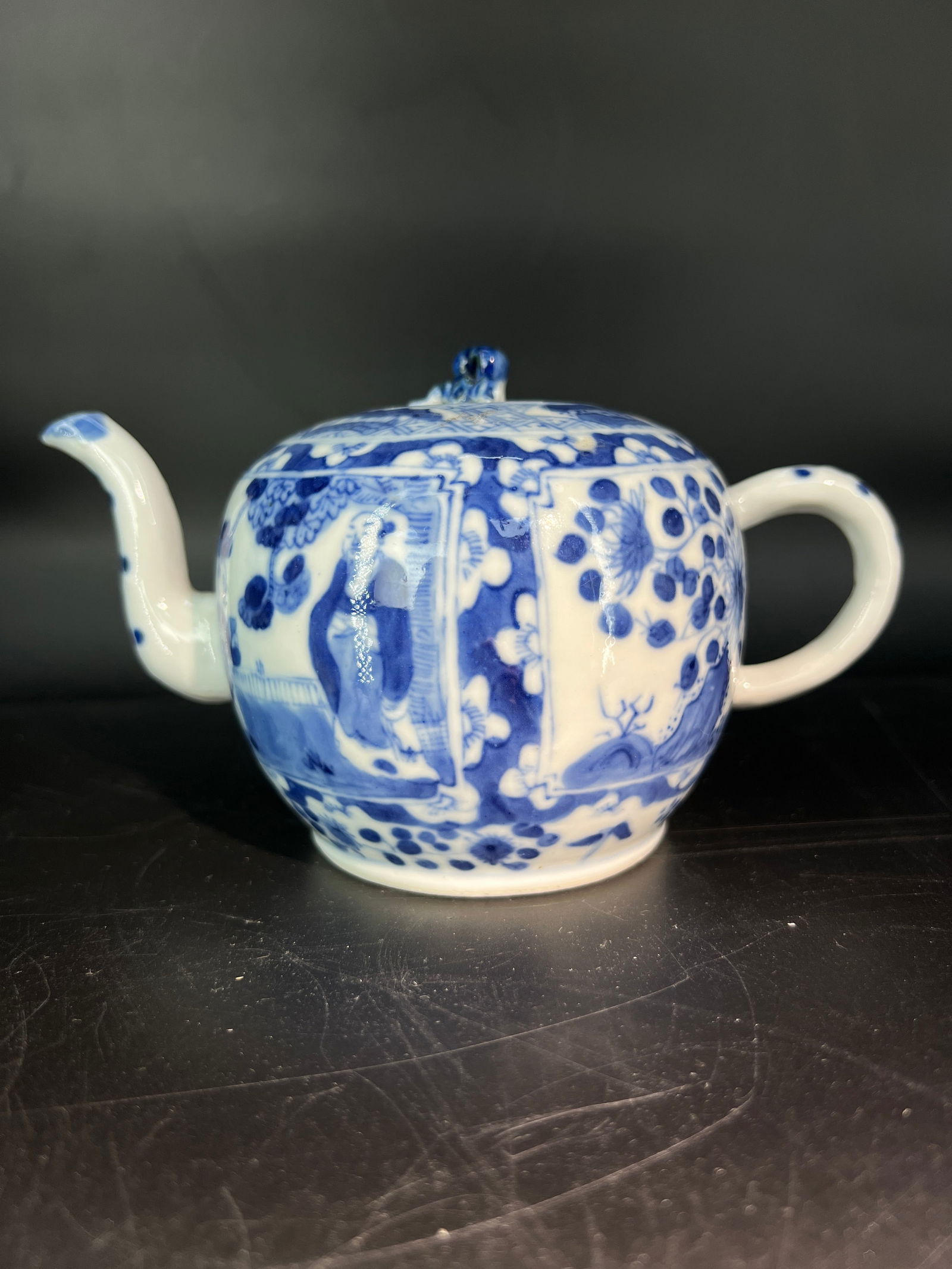 Late Qing Republic Blue and White Medallion Figures Teapot: H9cm W9cm Blue-and-white lobed melon-form teapot with figural cartouches, Late Qing to Republic period. Jingdezhen blue-and-white porcelain with domestic cobalt pigment, Late Qing to Republic period (