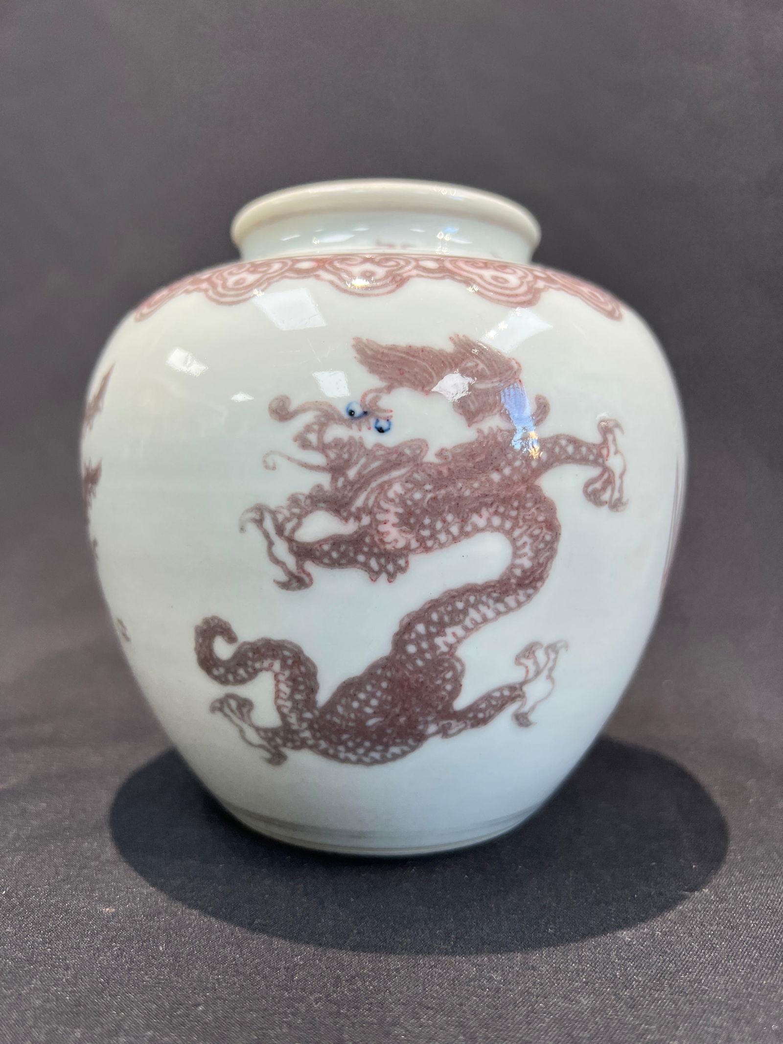 Qing Kangxi Underglaze Red (Blue and White Spot Color) Dragon Phoenix Small Jar with Kangxi: H12.2CM W11CM Kangxi Period, Qing Dynasty Underglaze Red (with Blue Accents) Dragon-and-Phoenix Small Jar, bearing six-character double-circle mark 'Made in the Kangxi Reign of the Great Qing.' Essent