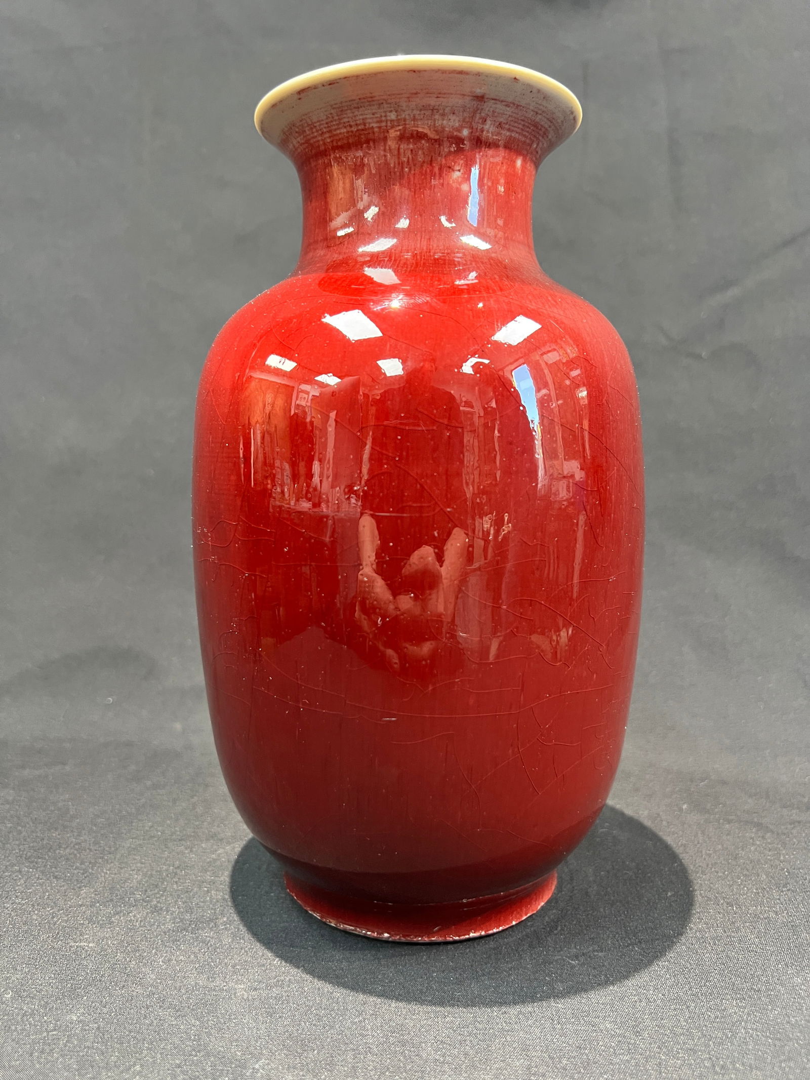 Republic Period Lang Kiln Red Glaze Lantern Vase (Export Porcelain): H22.9cm W12cm Republic Period Langyao Red Glazed Lantern Vase (Export Porcelain). Features: Lantern-shaped form with flared rim, short neck, globular body, and ring foot; fine and dense porcelain body