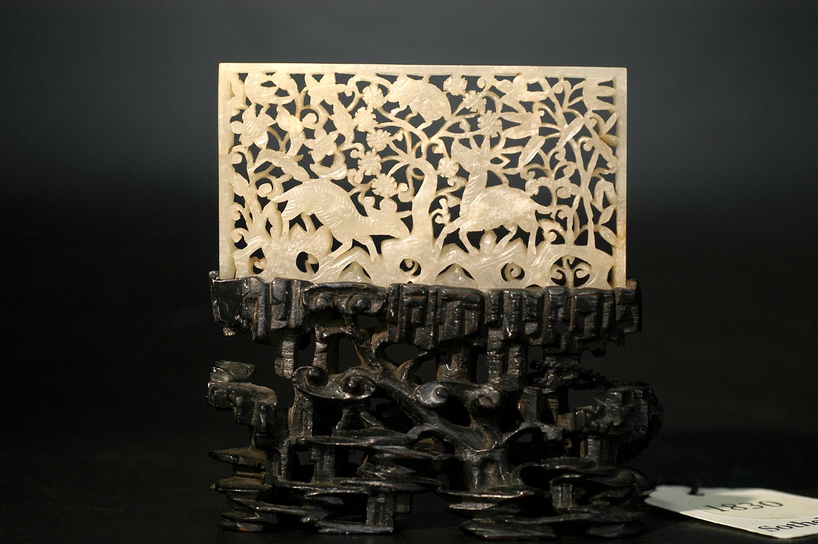 Ming Dynasty White Jade Openwork Animals and Flowers Plaque: H:4.1CM W:7.2CM Late Ming Dynasty Hetian White Jade Openwork Table Screen with Deer and Monkey Motifs. Period: Late Ming (16th-17th century). Material: Hetian white jade, warm lustrous texture with na