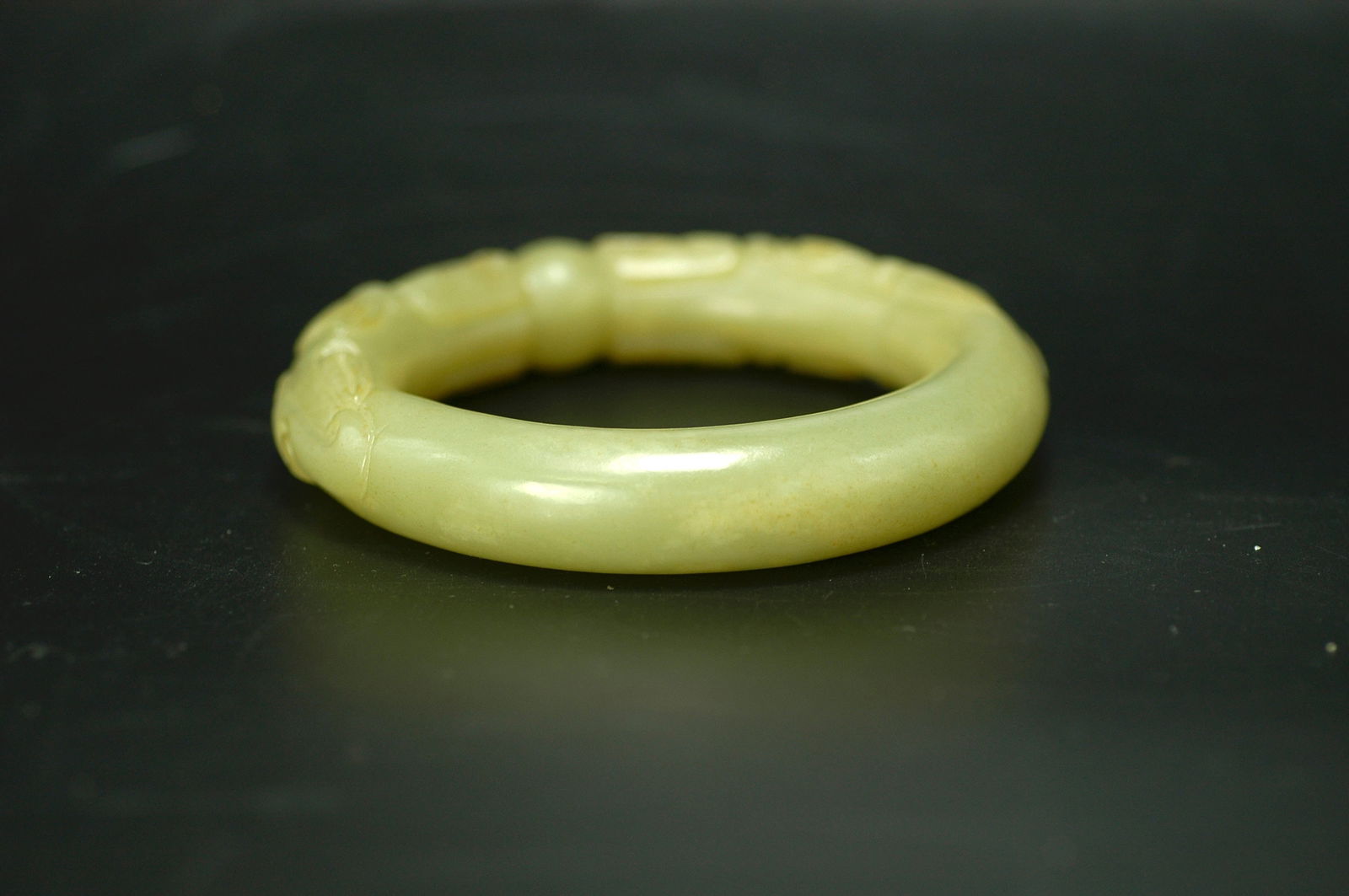 Qing Dynasty Yellow Jade Twin Dragons Playing Pearl Bangle (Round Wire): H2CM W9.8CM Mid Qing Dynasty Yellow Jade Bracelet with Double Dragons Playing with a Pearl (Round Section). Dating Conclusion: Mid Qing Dynasty (Qianlong-Jiaqing), an authentic example carved from Het