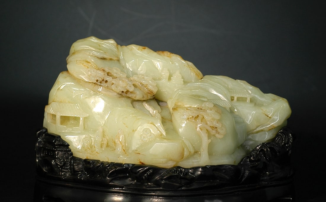 Republic Period or Later Hetian Greenish-White Jade Landscape Figures Mountain Scholar's Rock: H:8.5cm W:17.2cm. Designation: Mid Qing Dynasty (Qianlong–Jiaqing) Hetian celadon-white jade mountain carving with landscape and figures, from an old overseas auction collection, preserved in co