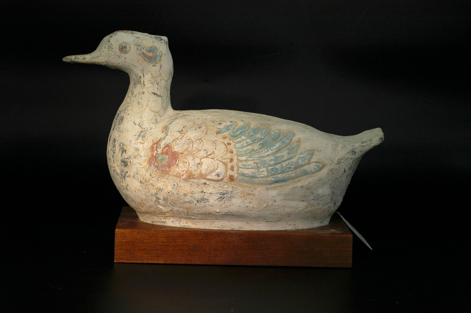 Han Dynasty Sancai Earthenware Duck Ornament, a Pair: H:23CM W:13CM L:34CM Han Dynasty Painted Pottery Duck with Sotheby's Provenance. Period: Western Han to Eastern Han Dynasty (206 BCE – 220 CE). Material: Grey pottery body with white slip, decor