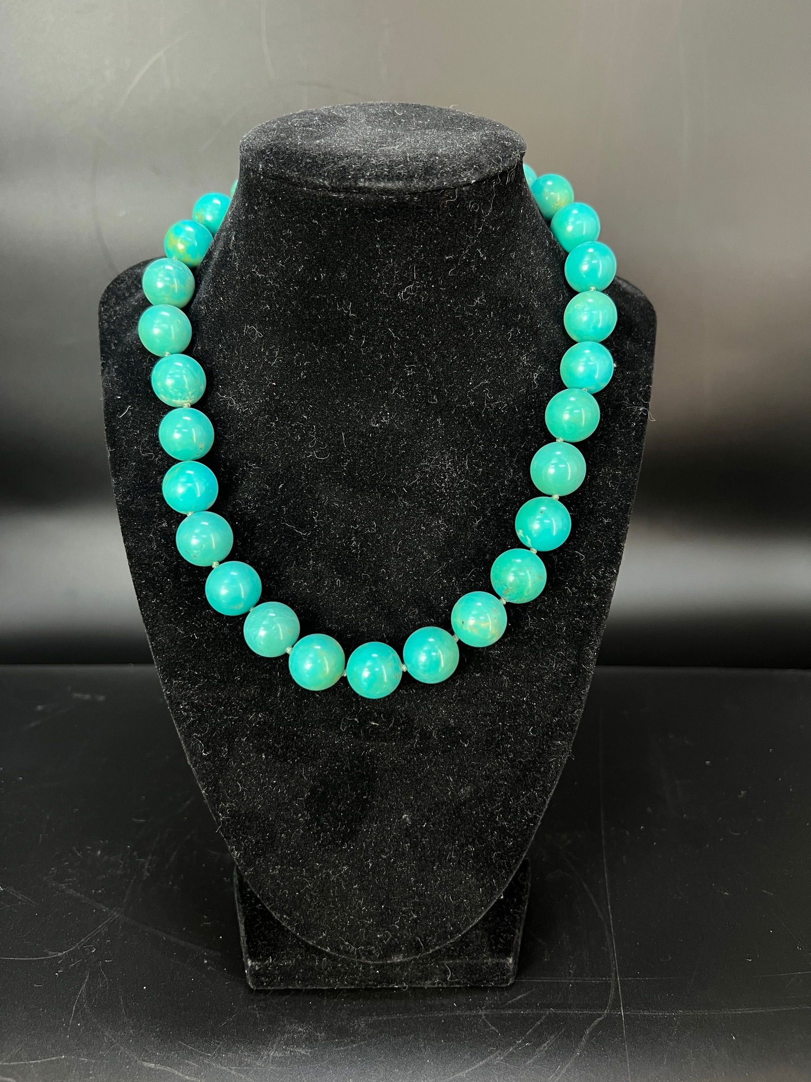 High-Fired Turquoise Round Bead Necklace: H1.4cm W1.4cm. High-Grade Turquoise Bead Necklace. Material: High-grade turquoise round beads with sterling silver clasp. Dating: Mid to late 20th century to contemporary (circa 1960 to present). Mark