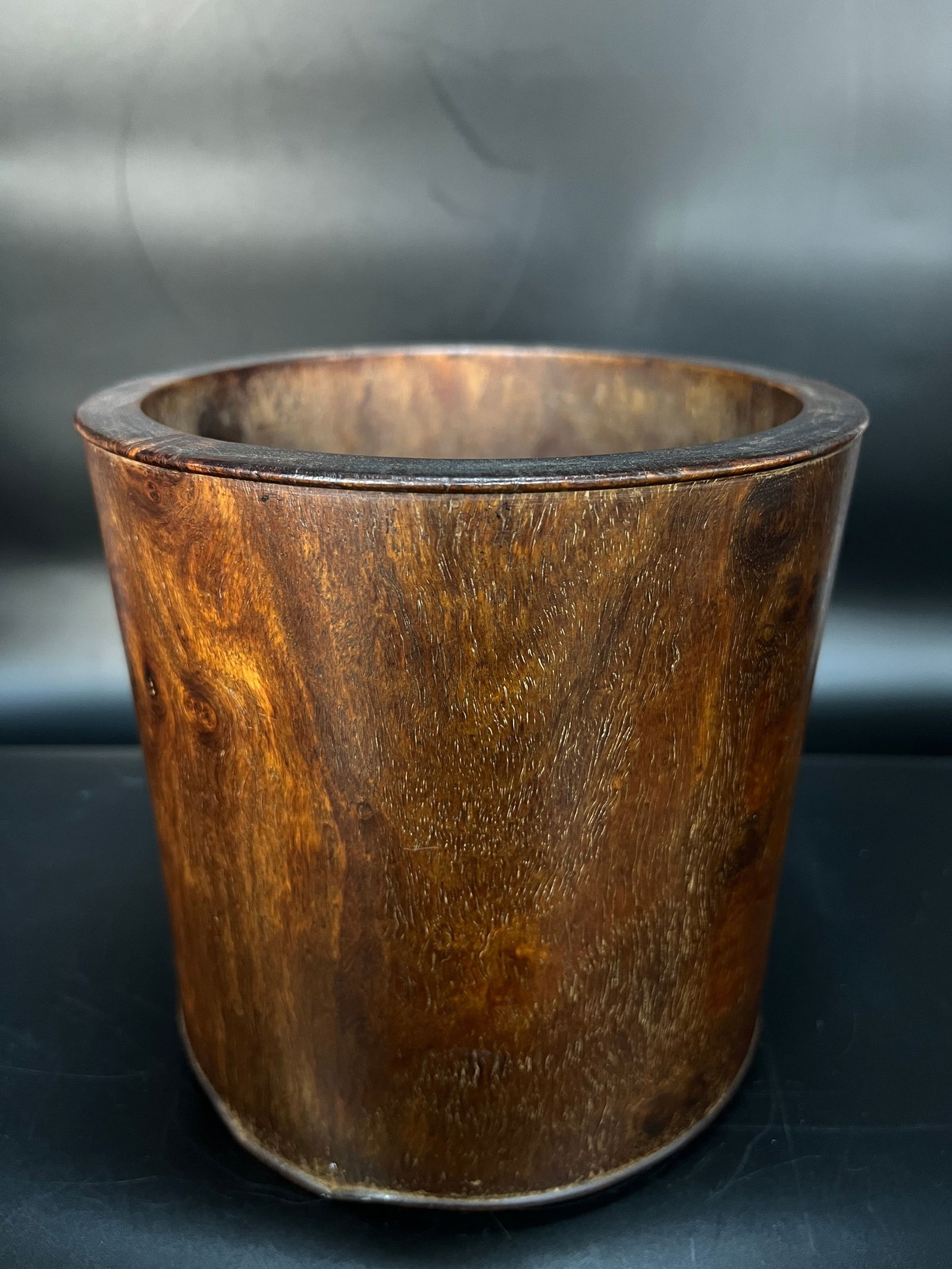 Republic Period or Later Huanghuali Wooden Brush Pot: H:16.5CM W:17CM Huanghuali Plain Brush Pot with Ghost-Face Grain Pattern. Made of huanghuali wood using single-block carving technique. Mid to late Qing Dynasty (approximately 18th-19th century).