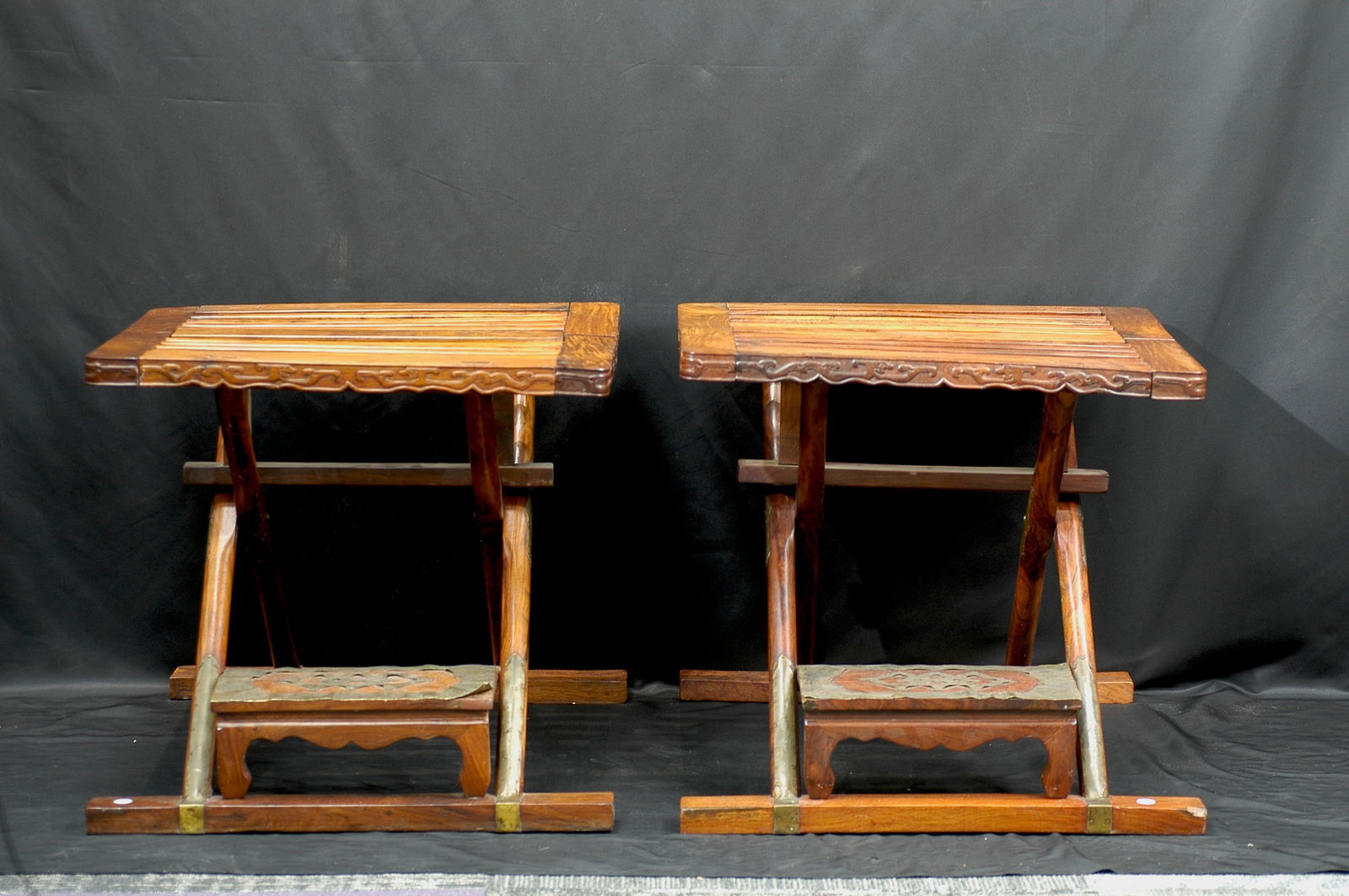 Republic Period Huanghuali Wood Folding Stool, a Pair: H:50CM W:56CM This exquisite pair of folding stools, also known as "Maza" in the classic Ming style, is masterfully crafted from premium Huanghuali wood, showcasing the timber's signature warm patina