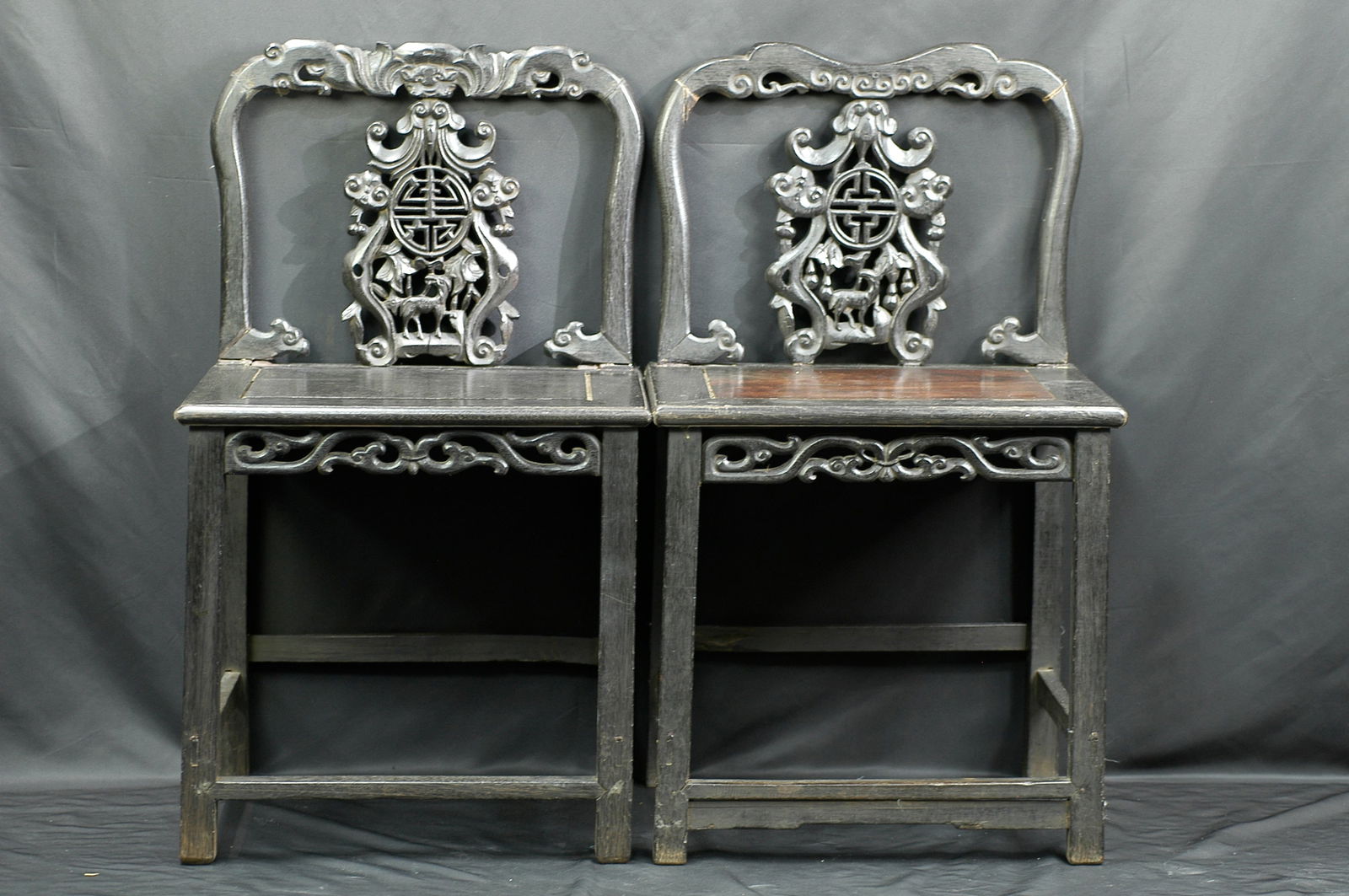 Late Qing Guangzuo Hardwood 'Fulushou' Wentang Chair, a Pair: H90cm W52cm Late Qing Cantonese hardwood 'Fu Lu Shou' motif wenduan chairs (pair). Classic Lingnan hall furniture with square form, framed back panel, straight legs with double-tier stretchers, tradit