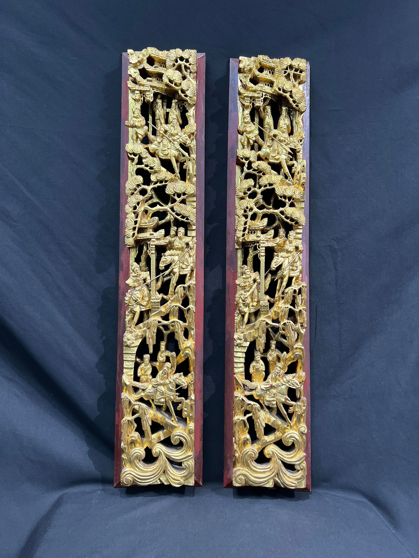 Qing Dynasty / Republic Period Chaozhou Gold Lacquer Wood Carved 'Warrior Figures' Panel Pair: H79CM W15.5CM Qing Dynasty/Republic Period Chaozhou Gilt-Lacquer Wood Carved 'Martial Figures' Pair of Panels (Openwork Carving). Material: Camphor wood with gilt lacquer, cinnabar red lacquer border
