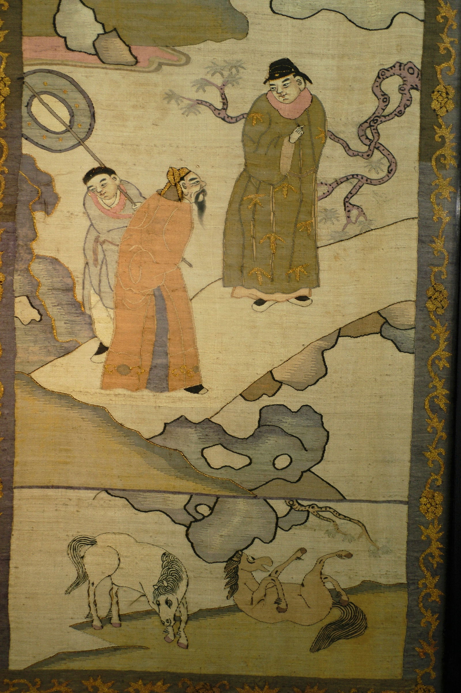 Qing Dynasty Kesi Silk Woven Figural Narrative Mirror Frame (Gold Border Kesi): H: 165cm W: 39cm. Kesi (tapestry-woven silk) hanging panel with figural narrative scenes. Period: Ming-Qing Dynasty. Material and Technique: Traditional kesi weaving technique (continuous warp, cut we