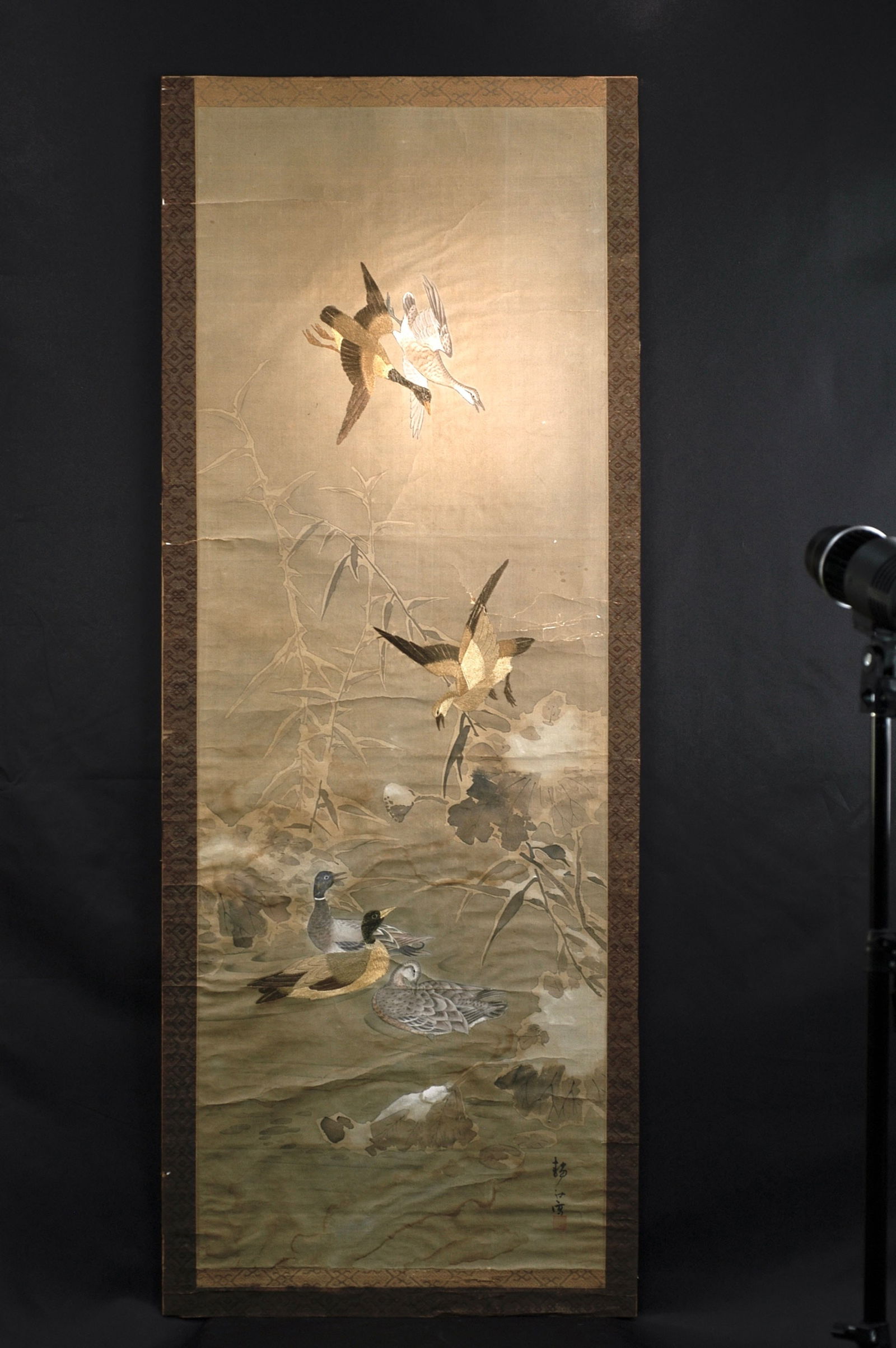 Japanese Edo to Meiji Period 'Embroidered Painting' (Embroidery + Painting) Reed Geese Hanging: H:38.5cm W:26.6cm Japanese Embroidered Painting of Reeds and Geese Hanging Scroll. Period: Edo–Meiji (18th–19th century). Technique: Silk with gold thread embroidery of reeds and geese plu