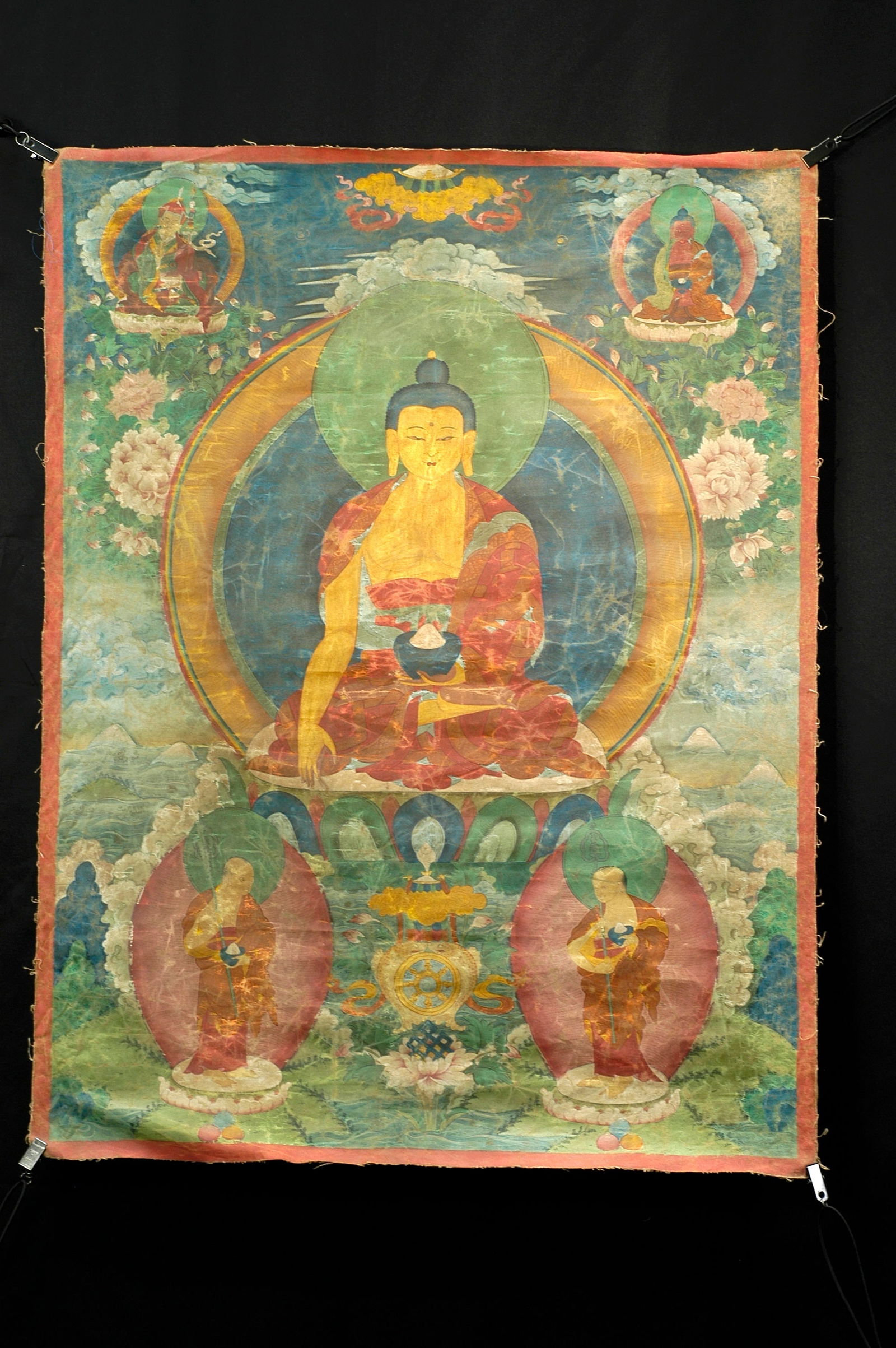 Republic Period or Later Thangka (Buddhist Figure Colored Painting): Subject: Main deity Shakyamuni Buddha, flanked by disciples Kasyapa and Ananda, with Padmasambhava and Amitayus Buddha above. Period: Late Qing Dynasty (19th century), Eastern Kham Tibetan style. Mate