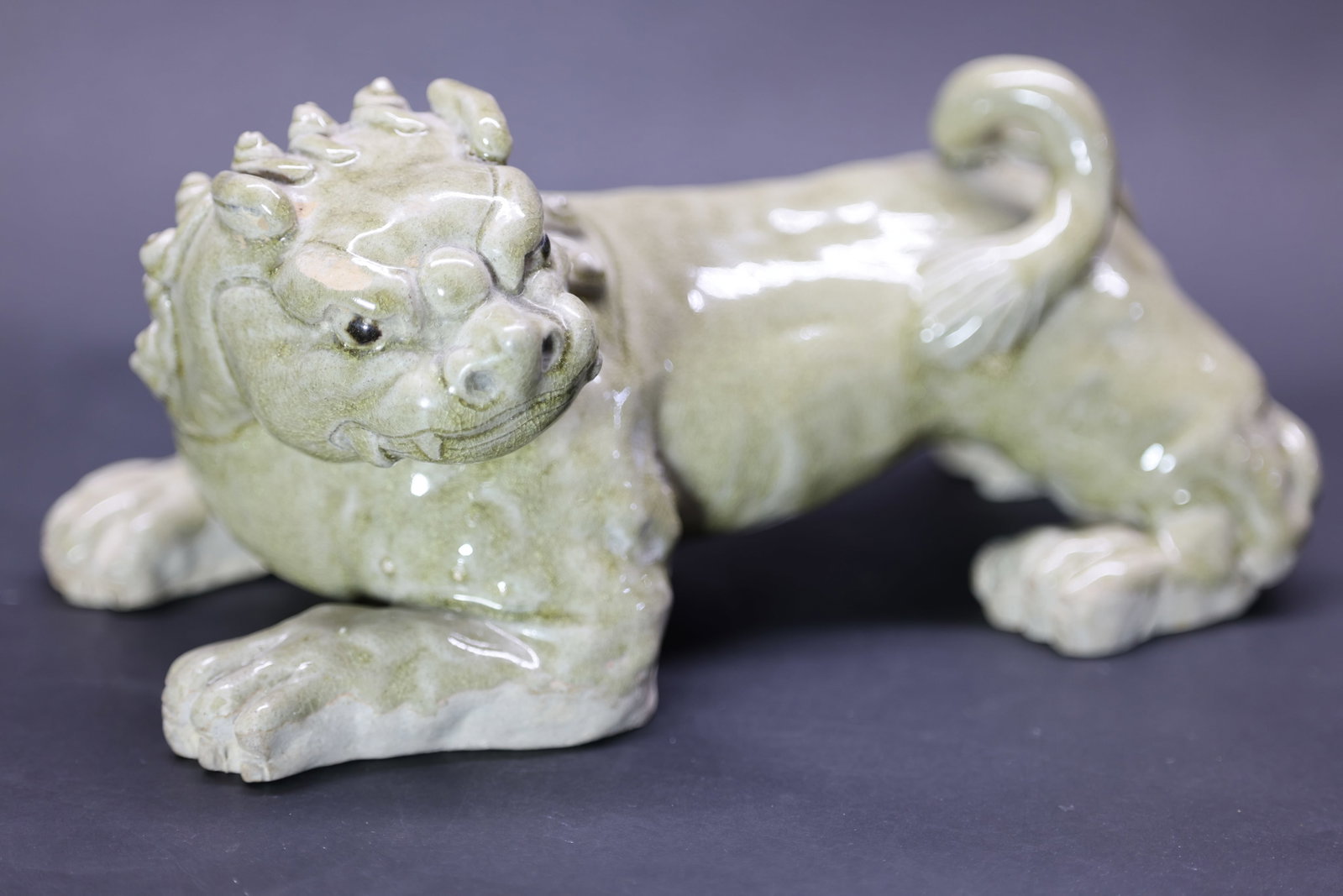 A 'Yue' Celadon 'Recumbent Lion' Figure, Six Dynasties to Tang Dynasty (1 of 10)