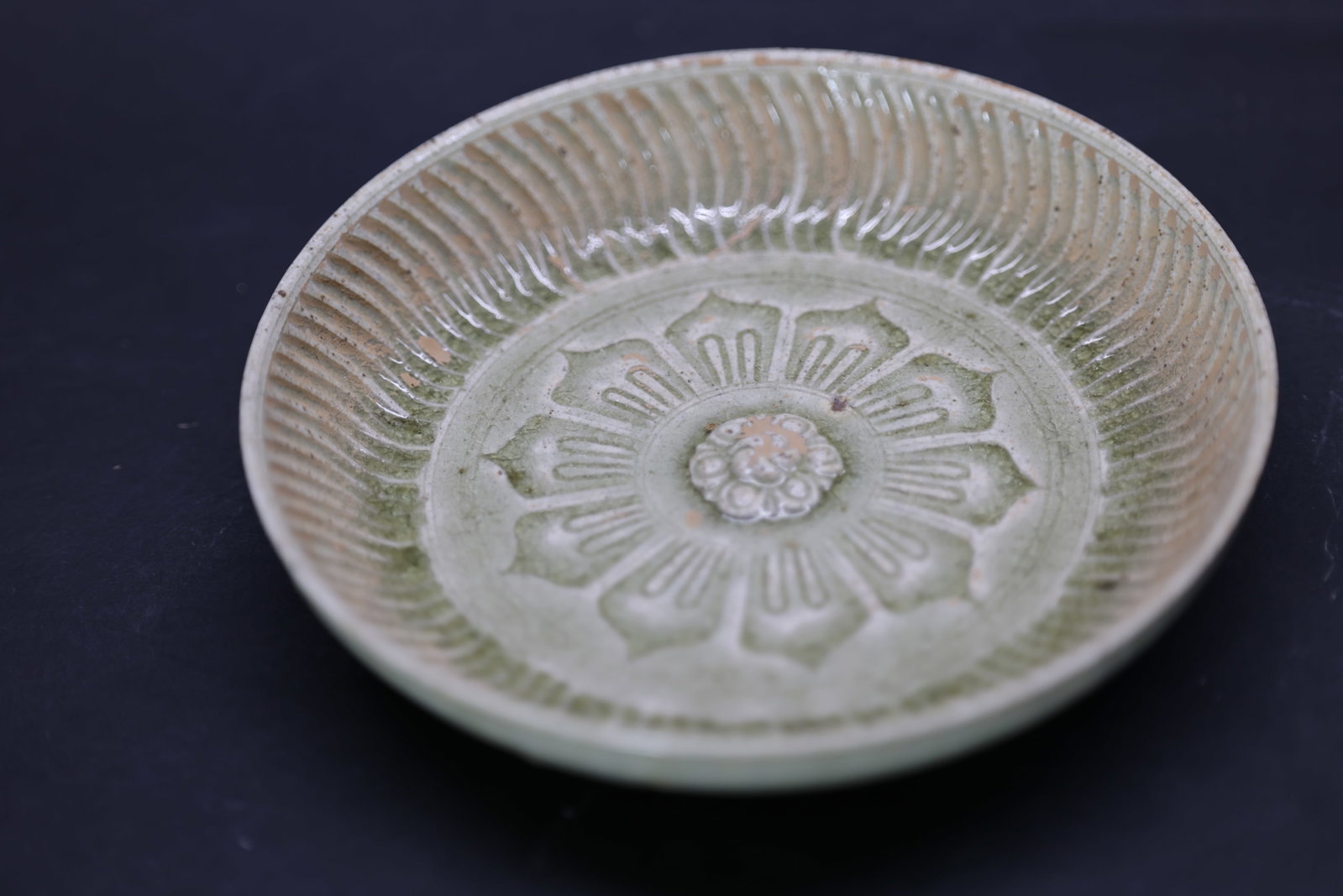A 'Yue' Celadon 'Lotus' Dish, Northern Song Dynasty (1 of 7)