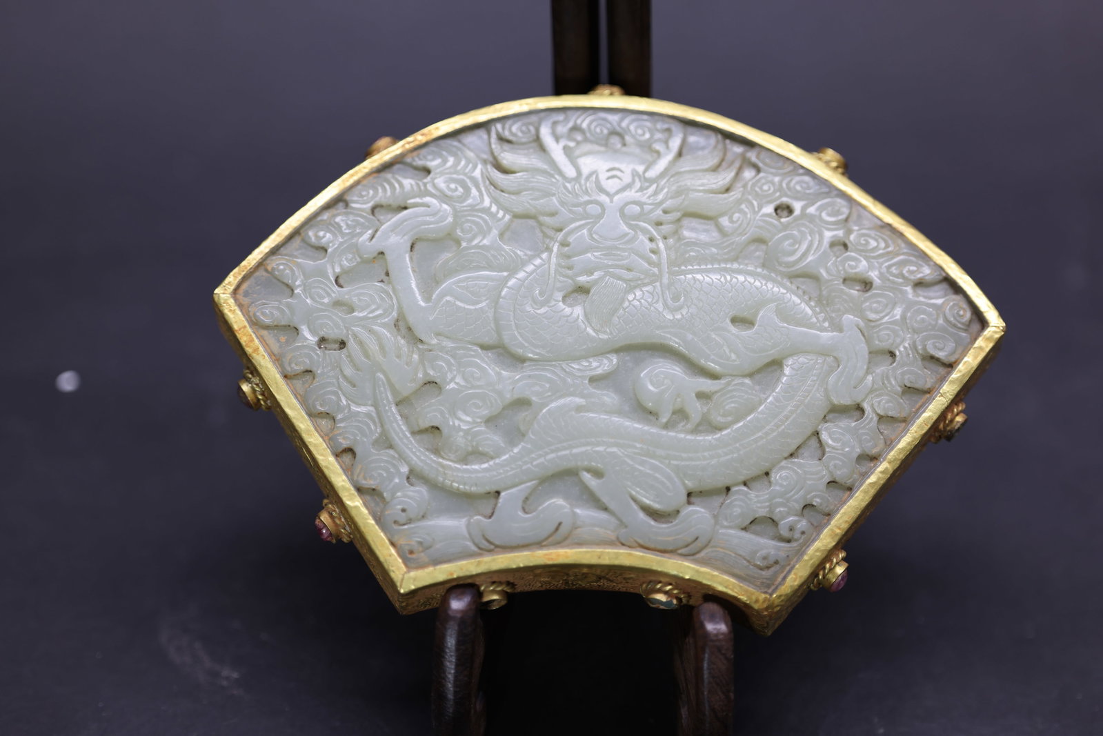 A Gilt-Silver and White Jade-Inlaid 'Dragon' Box and Cover, Qing DynastyA Gilt-Silver and White: Estimated Date: Mid to Late Qing Dynasty. An imperial-style gilt silver and jade fan-shaped scholar's box.Attribution: Elegantly fashioned in a graceful fan-shaped form, the box is constructed of silv