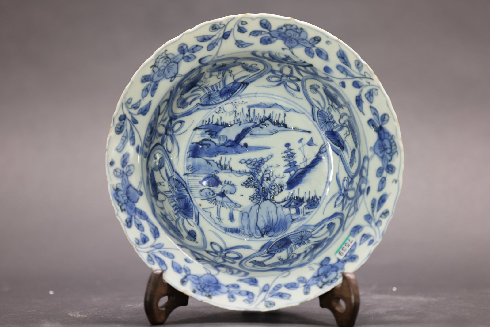 A Blue and White 'Landscape and Figures' Foliate Wash Basin, Qing Dynasty (1 of 7)