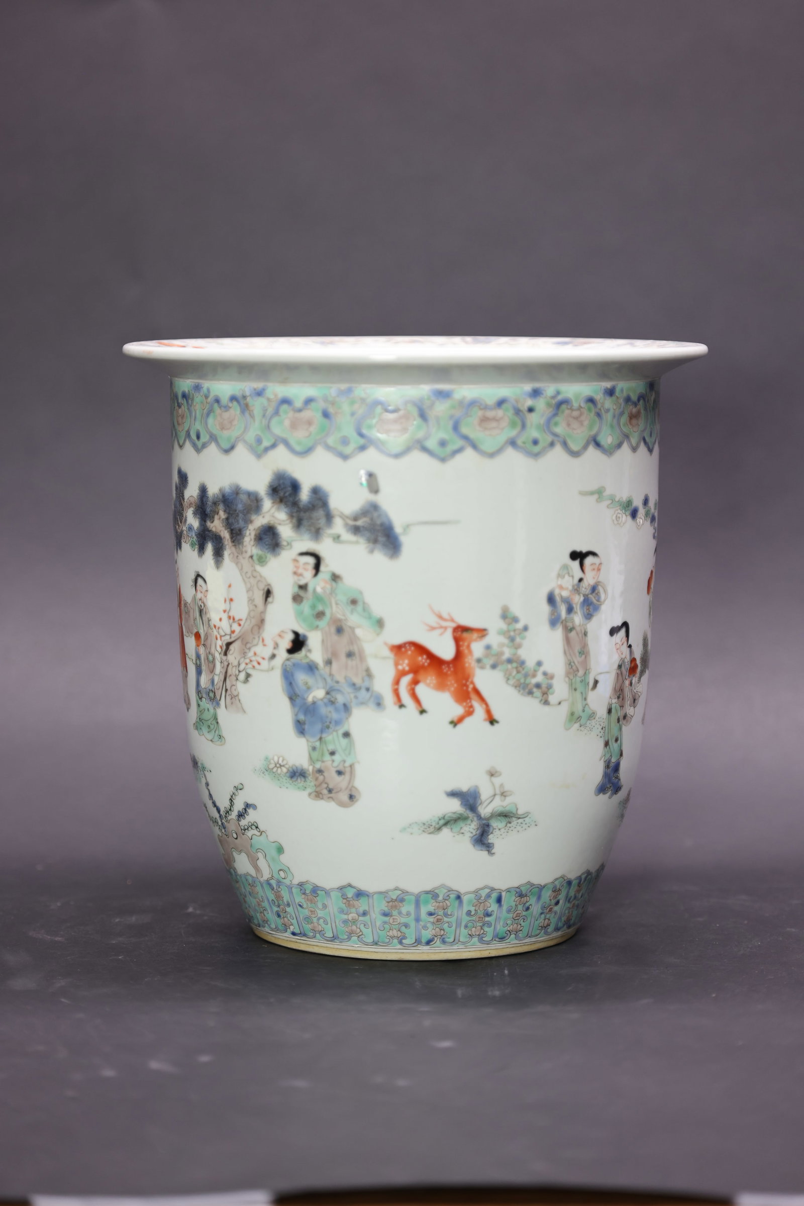 A 'Jiaqing'-Style 'Famille-Rose' 'Figures' Large Flower Pot, Late Qing Dynasty: Estimated Date: Late Qing to Republic Period. A Jiaqing-style famille rose porcelain jardinière bearing an apocryphal "Made during the Jiaqing Reign of the Great Qing" mark.Attribution: The jardiniè
