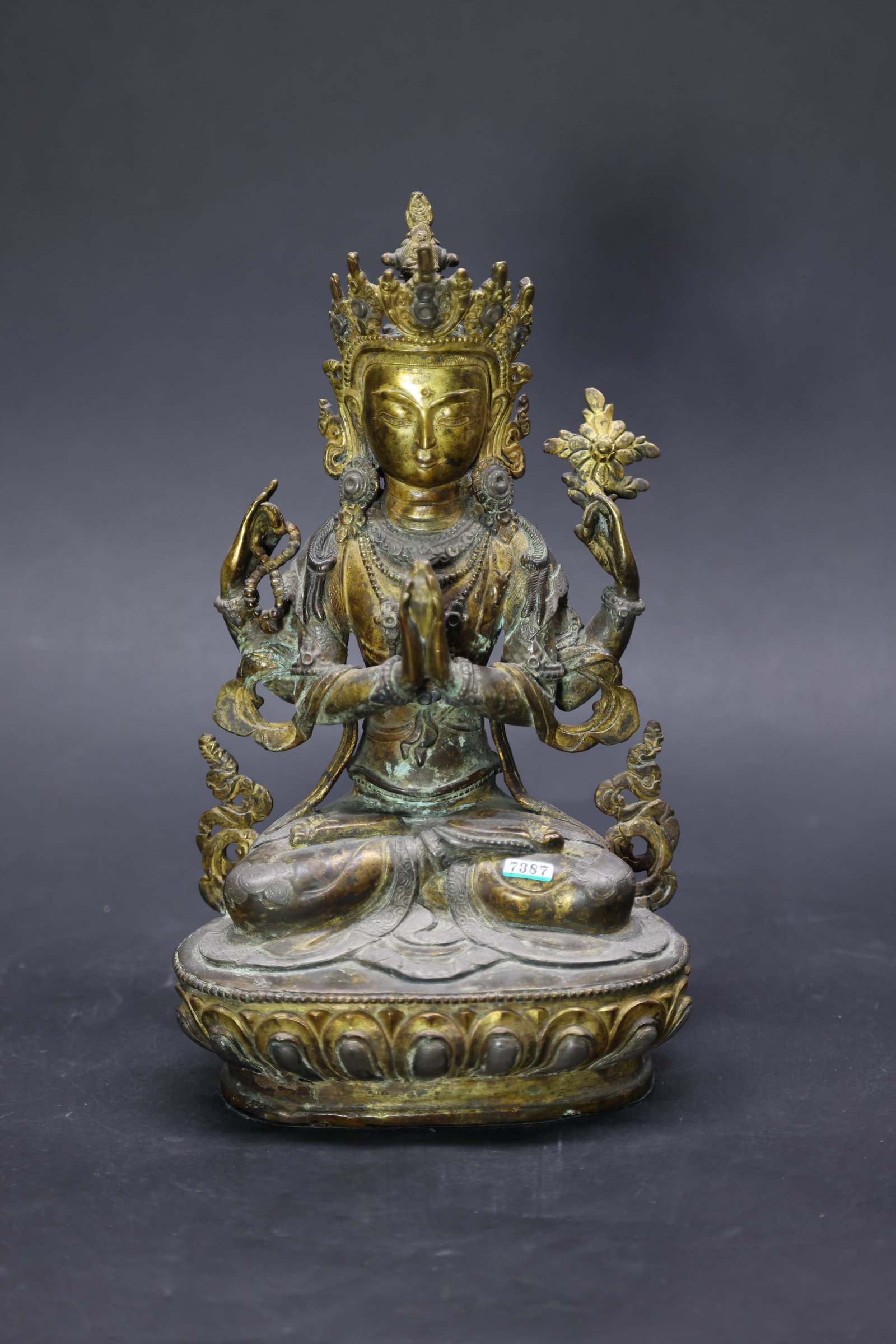 A Partly Gilt-Bronze Figure of a Four-Armed Avalokiteshvara, Qing Dynasty: Estimated Date: Mid to Late Qing Dynasty. A Tibetan gilt-bronze figure of the Four-Armed Avalokite?vara (Chenrezig).Attribution: The figure represents the bodhisattva Four-Armed Avalokite?vara (Chenre