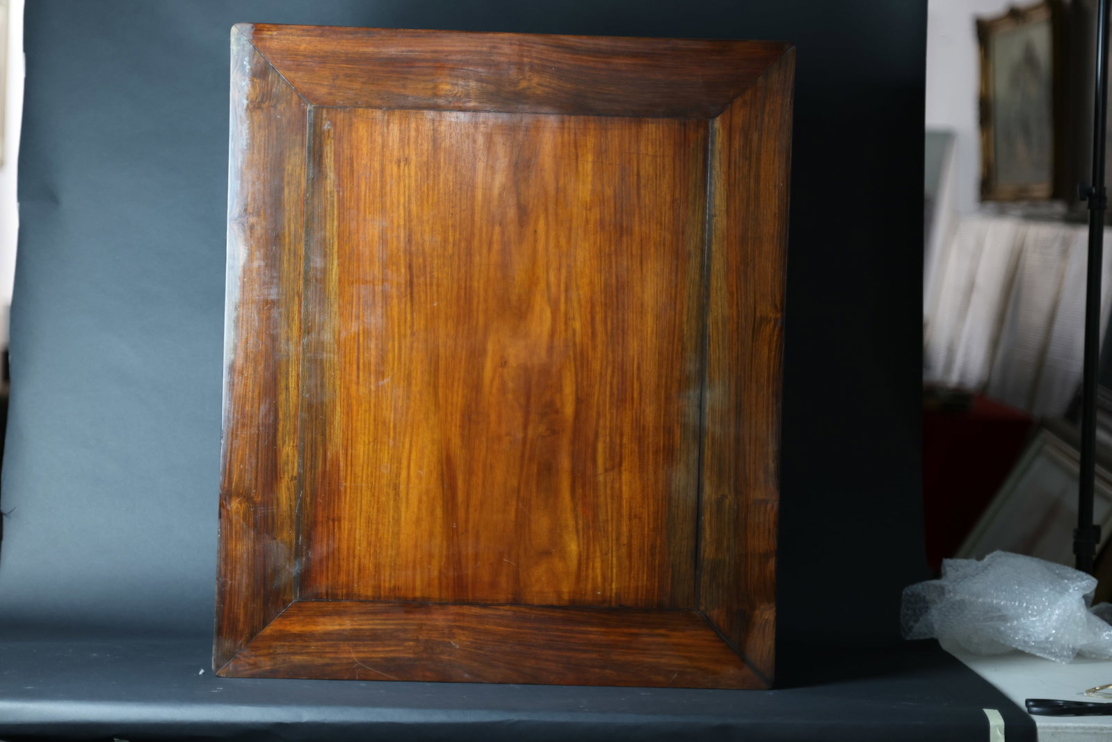 A Hongmu Square Scholar's Table, Qing Dynasty: Estimated Date: Mid to Late Qing Dynasty. A hardwood square waisted scholar's stand.Attribution: The stand is finely constructed from hardwood (commonly referred to as hongmu) with a single-board top 