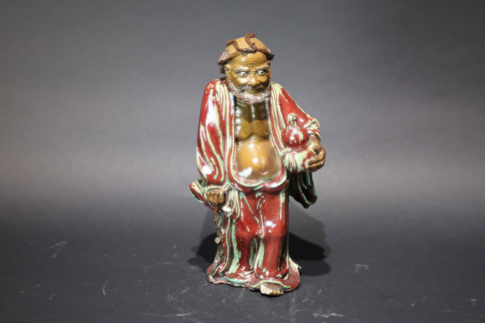 A Flambé-Glazed Figure of Tieguaili, Shiwan Ware, Qing Dynasty (1 of 9)