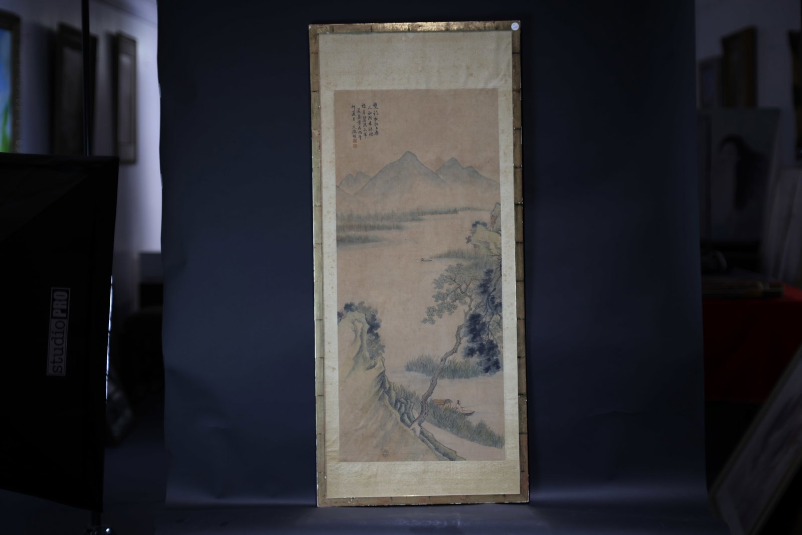 An 'Autumn River Fishing' Landscape Scroll, Late Qing Dynasty / Republic Period: Estimated Date: Mid to Late Qing Dynasty. A landscape painting on paper bearing an apocryphal signature of Wen Zhengming, executed in the style of the Wu School.Attribution: Painted in ink and light c