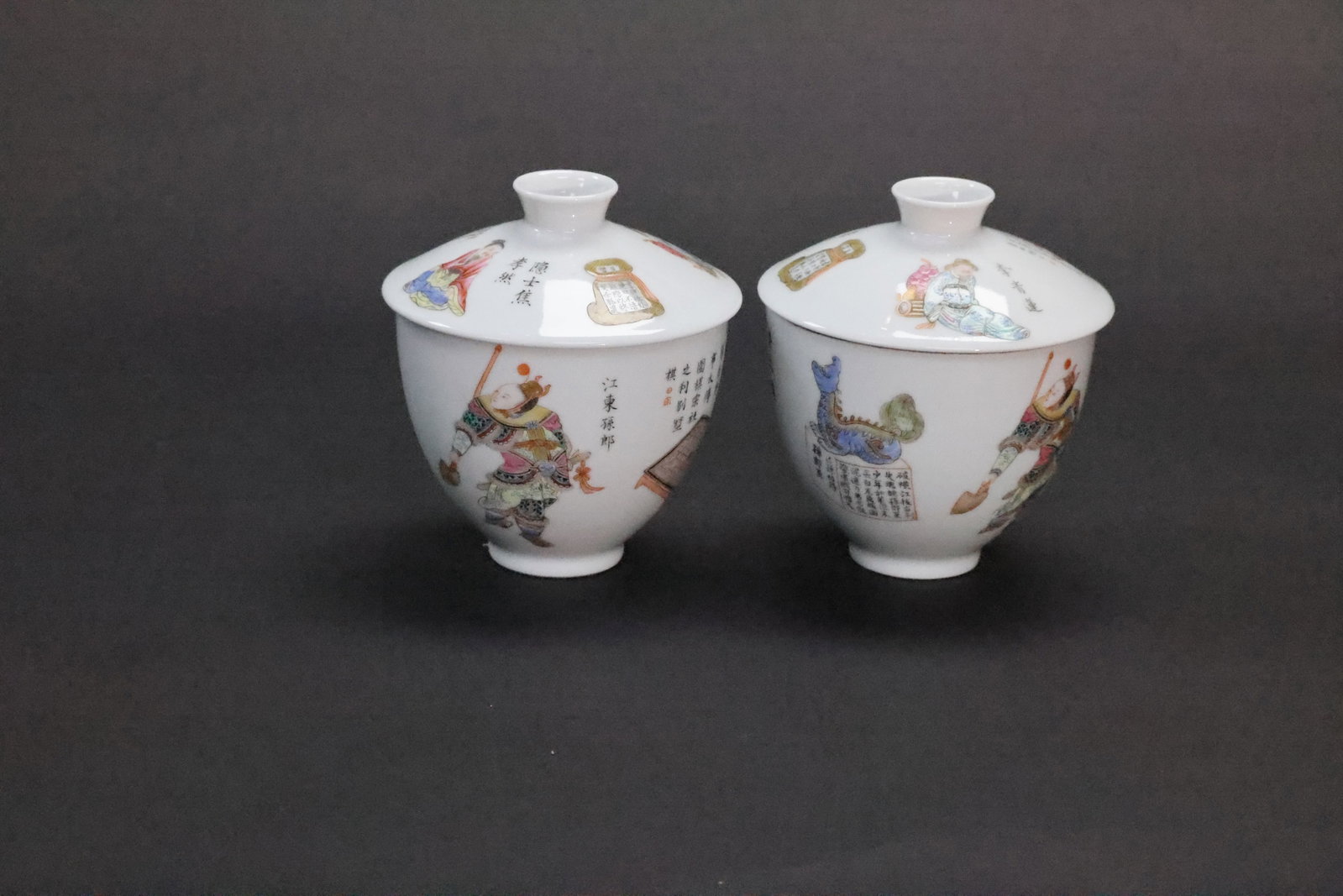 A Pair of 'Wushuangpu' 'Figures and Poems' Famille Rose Covered Bowls, Late Qing Dynasty / Republic: Estimated Date: Late Qing Dynasty to the Republican Period. A pair of famille rose porcelain covered tea bowls (gaiwan), bearing apocryphal Xianfeng reign marks.Attribution: This matching pair of Jing