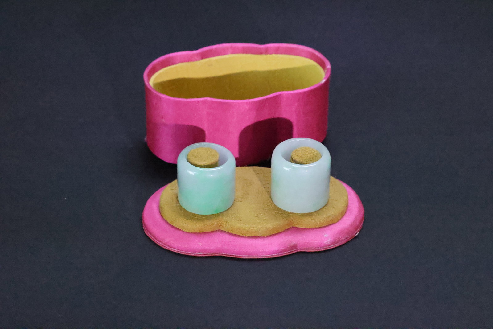 A Pair of Natural Jadeite 'Plain' Archer's Rings, Late Qing Dynasty (1 of 5)