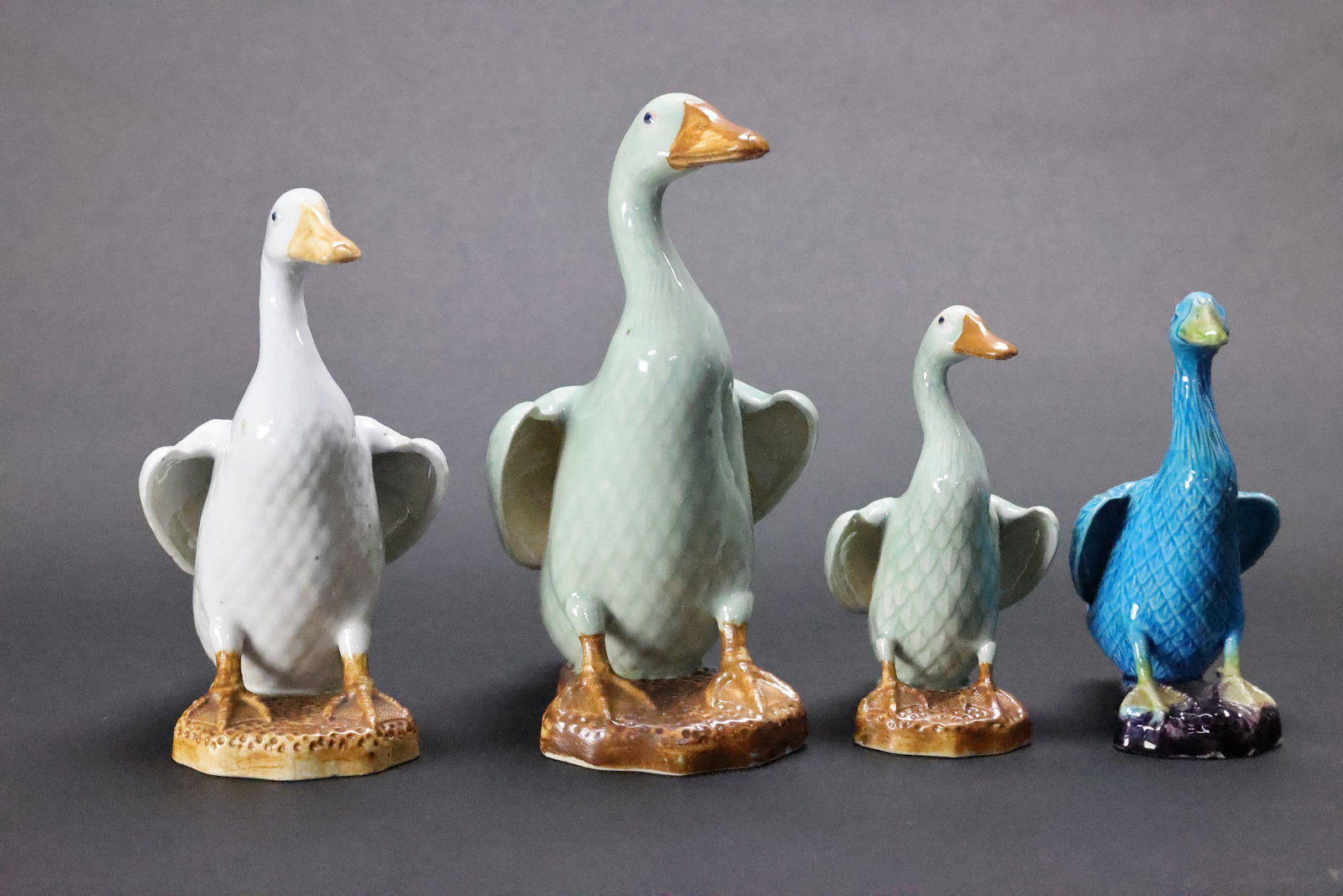 A Rare Set of Four Polychrome 'Huang Tongxing' Mark Export Dutch-Style Glazed Duck Figures, Republic: Estimated Date: Late Republican Period (early to mid-20th century). A group of four Jingdezhen naturalistic porcelain ducks produced for the export market.Attribution: This collection of naturalistica