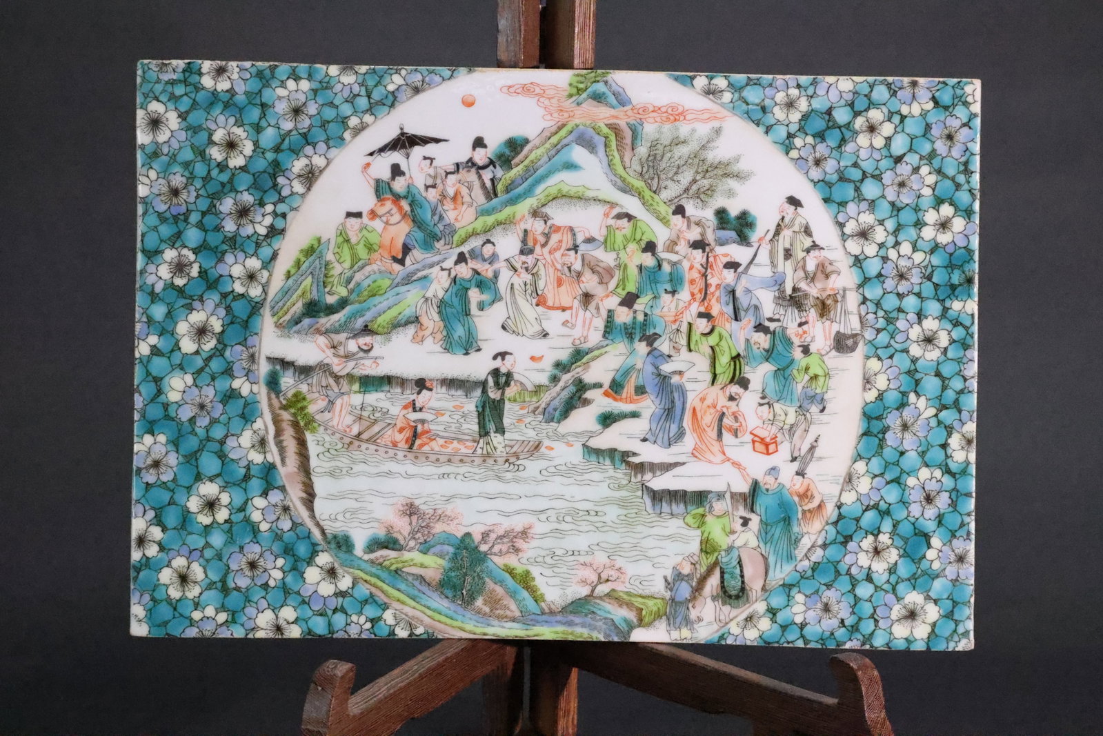 A Wucai-Style 'Ice-Plum and Narrative Figure' Canvas Wall Art, Style of the Late Qing Dynasty: Estimated Date: Contemporary. A famille verte-style porcelain plaque in the Qing decorative tradition.Attribution: This porcelain plaque is a modern decorative work executed in the style of Qing dynas